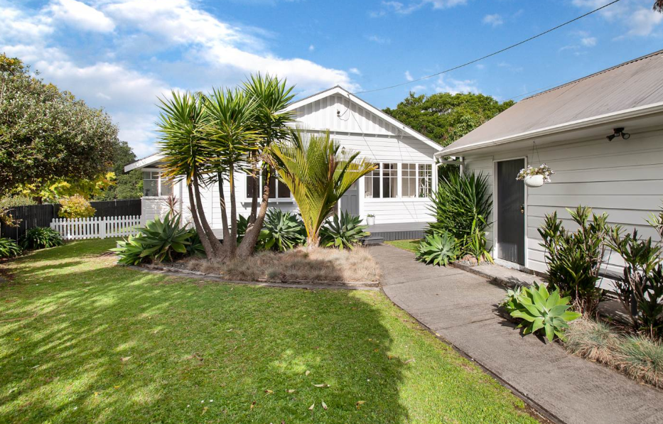 Tidy lawn and garden outside a home